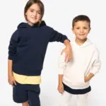 NS438-19_2025 - Hidalgo-werbeartikel Ecologische oversized kindersweater met capuchon