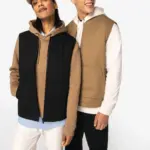 Ecologische gevoerde uniseks bodywarmer van twill met teddykraag
