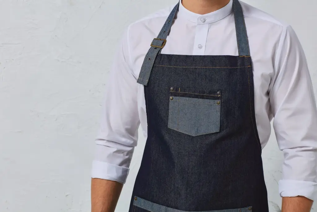 PR127_2024 - Hidalgo-werbeartikel Domain - Contrast denim halterschort — productfoto 2