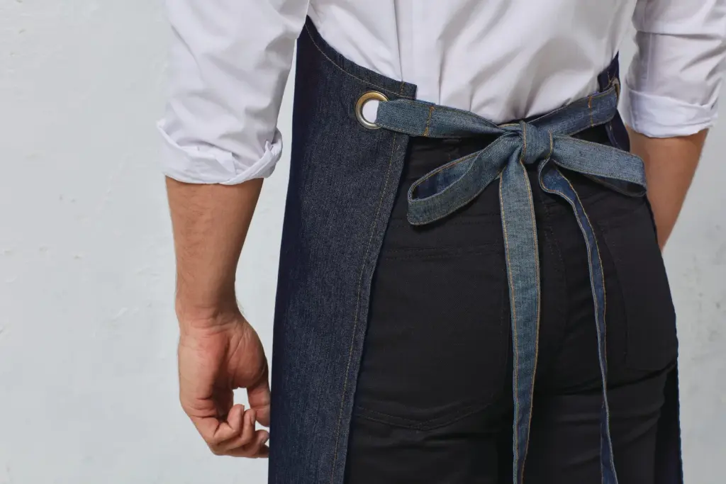 PR127-2_2024 - Hidalgo-werbeartikel Domain - Contrast denim halterschort — productfoto 3