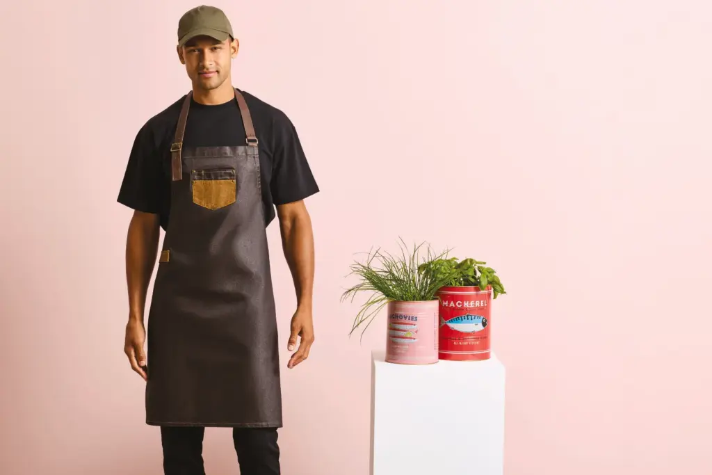 Division - Waxed look denim bib apron with faux leather