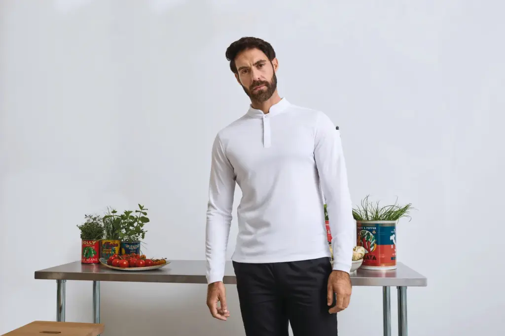 PR647_2026 - Hidalgo-werbeartikel Coolchecker Essential kokspolo met lange mouwen — productfoto 2