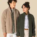 Uniseks sweater van sherpa met rits en afhangende schouders