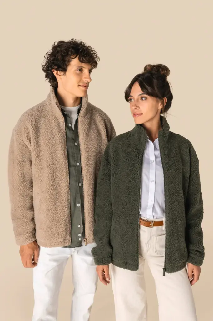 Uniseks sweater van sherpa met rits en afhangende schouders