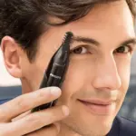 NT5650|Philips Neus-, oor-, wenkbrauwen detailtrimmer met 5 accessoires — productfoto 2