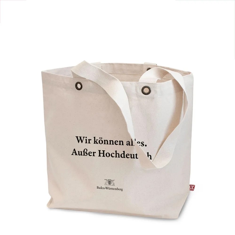 LAGOS – Canvas tas met bodemvouw, lange hengsels en metalen oogjes