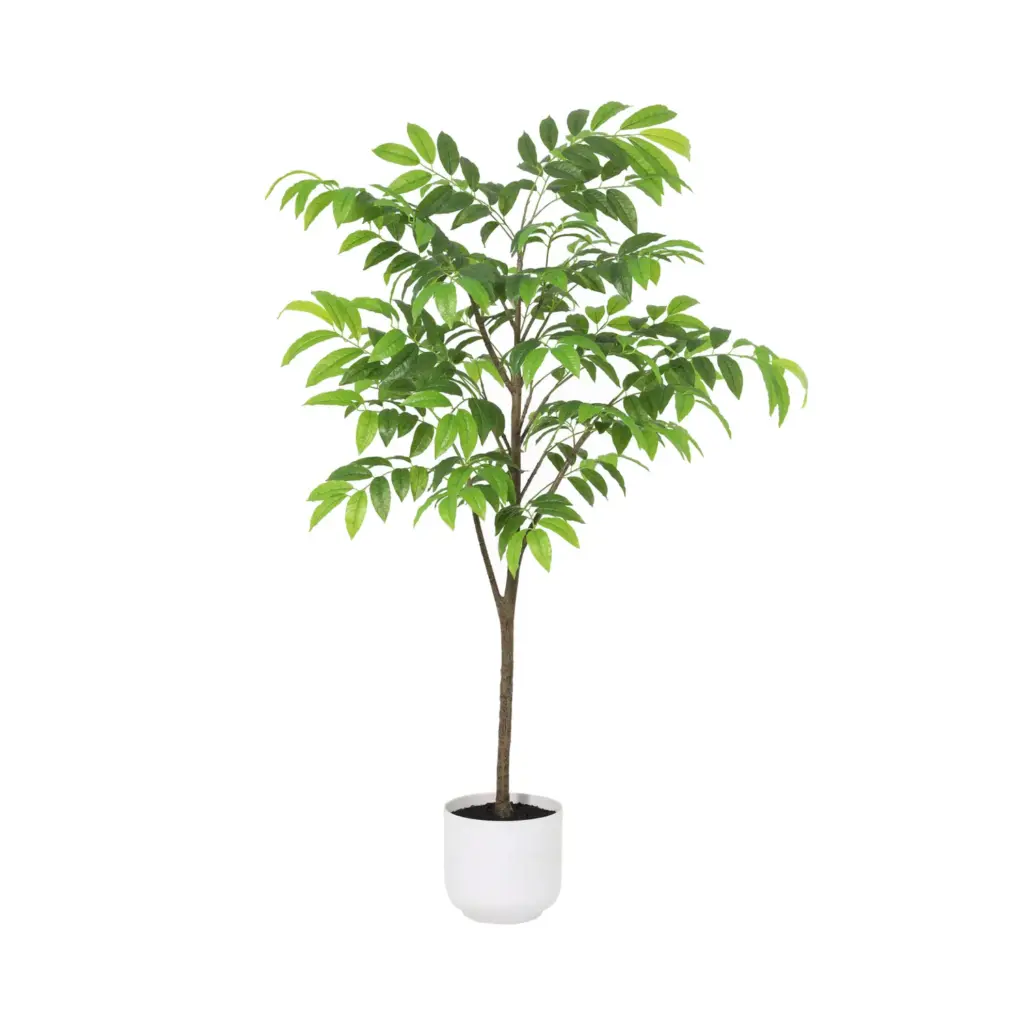 Tropische kunstplant in witte pot